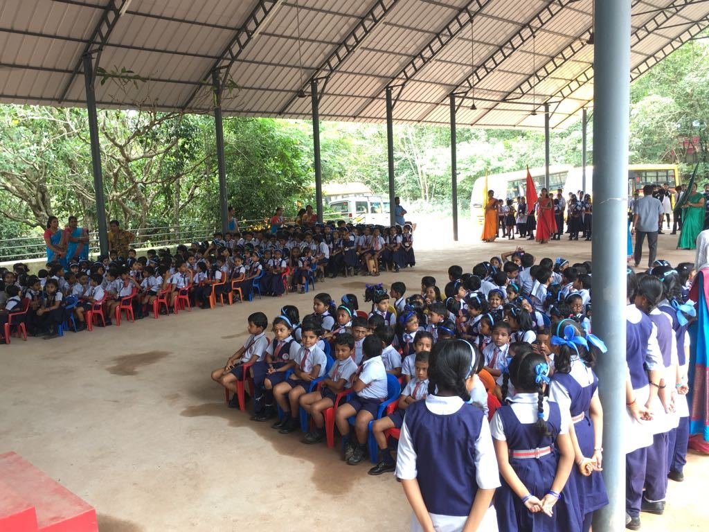 Students seated in rows for the school assembly